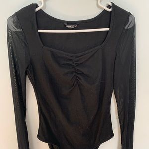 black mesh body suit